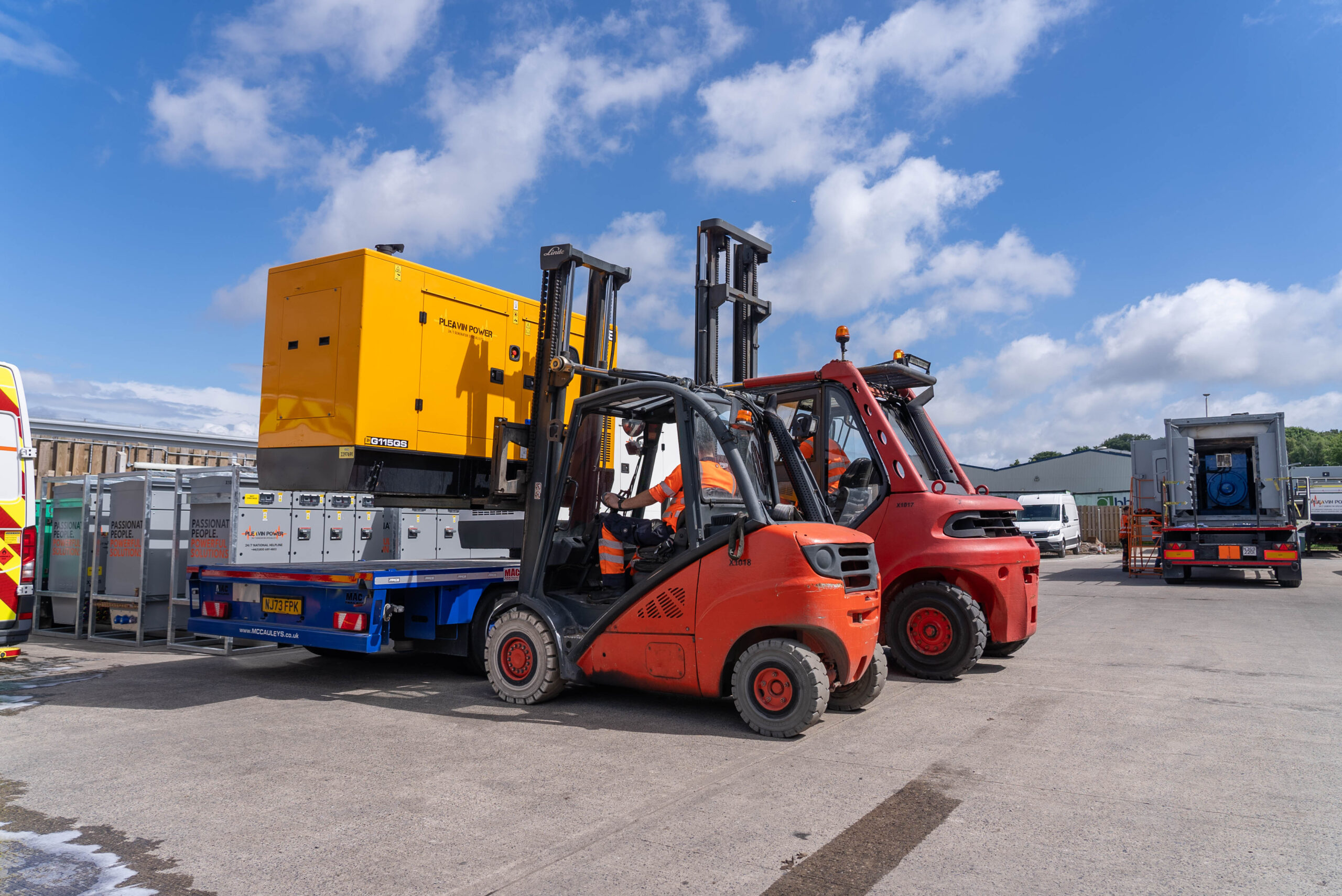 Two generators being loaded on to a wagon