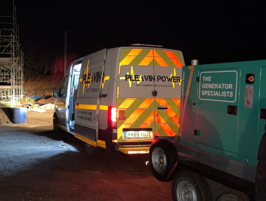 A Pleavin Power van showing the employees connecting a generator during an emergency service