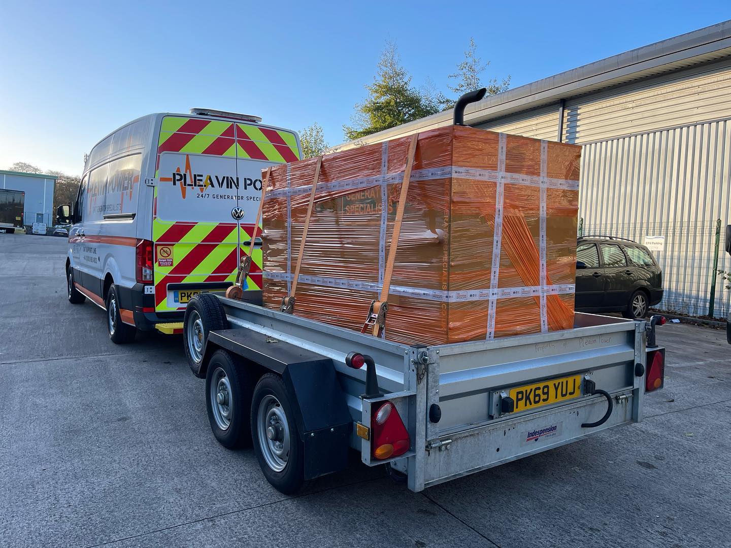 A pleavin Power van transporting a generator for one of their jobs