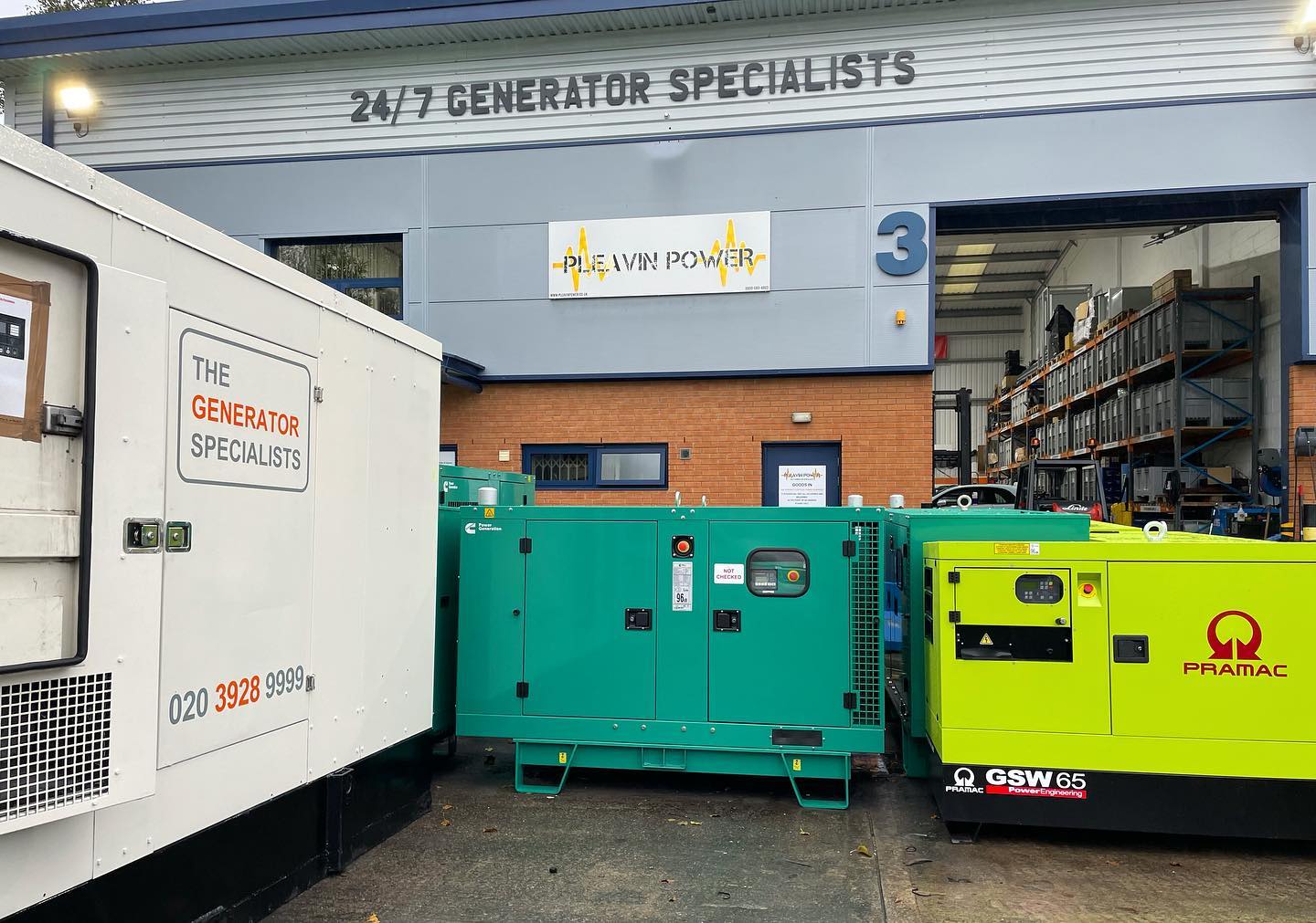 The Pleavin Power headquarters with a green and lime green Pramac GSW 65 generators beside each other.