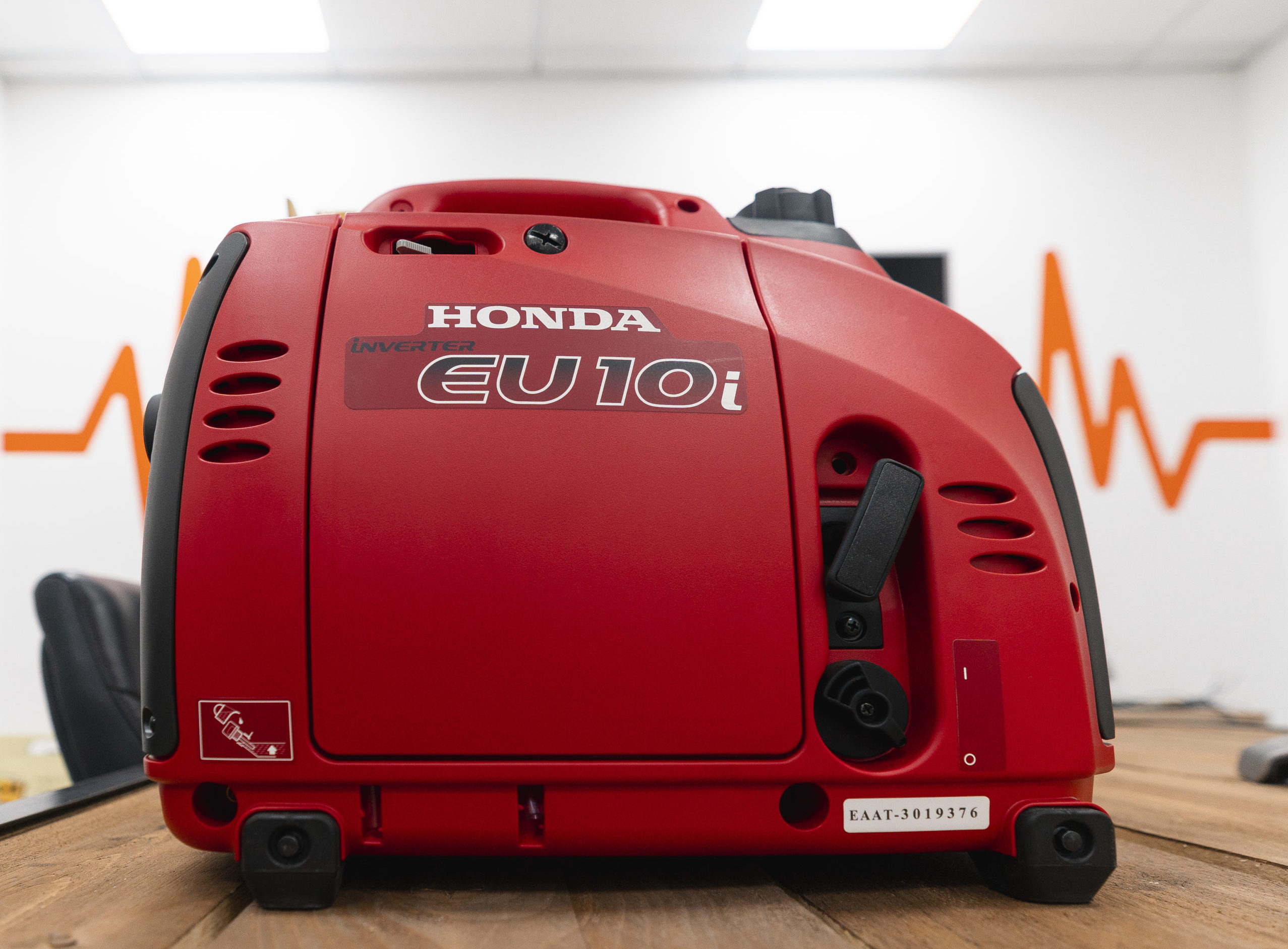 A red EU10i Inverter suitcase Honda Generator