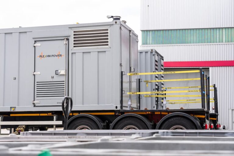 Two large white Pleavin Power generators placed outside